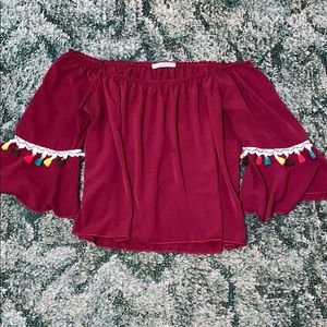 Off the shoulder shirt.